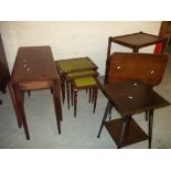 FIVE ITEMS INCLUDING AN OAK SERVING TROLLEY, FOLDING TABLE, A DROP LEAF TABLE, A LEATHER INLAID NEST