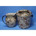 AN ANTIQUE LIDDED POT TOGETHER WITH A JUG