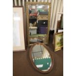 A RECTANGULAR FRAMED MIRROR APPROX. 83 X 45 CM TOGETHER WITH AN OVAL FRAMED MIRROR APPROX. 65 X 40