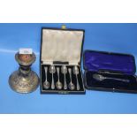 A QUANTITY OF SILVER ITEMS TO INCLUDE A CANDLESTICK, SPOONS, SUGAR TONGS ETC.
