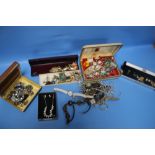 A QUANTITY OF COSTUME JEWELLERY, WRIST WATCHES ETC.