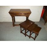 A SOLID OAK HALL TABLE AND A NEST OF TABLES