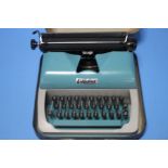 A CASED LILLIPUT TYPEWRITER