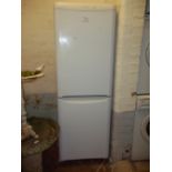 AN INDESIT FRIDGE FREEZER