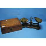 A SET OF AVERY SCALES AND WEIGHTS AND A WRITING SLOPE