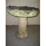 A CONCRETE BIRD BATH