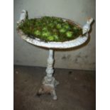 A CAST IRON BIRD BATH