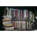 A PLASTIC TUB OF OVER 200 CDS