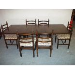 AM EXTENDING OAK DINING TABLE AND SIX CHAIRS