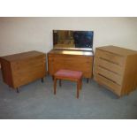 AN ALFRED COX DRESSING TABLE AND A CHEST OF DRAWERS TOGETHER WITH A STAG CHEST OF DRAWERS AND