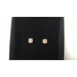 A PAIR OF 18 CT WHITE GOLD FOUR CLAW-SET RBC DIAMONDS STUDS, DIAMONDS 0.85 CT, BOXED