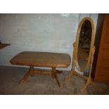 A PINE SWIVEL DRESSING MIRROR AND A LARGE PINE COFFEE TABLE