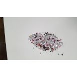 A BAG OF LOOSE, MIXED STONES INCLUDING CUBIC ZIRCONIA, SAPPHIRE, RUBY EMERALD, GARNETAND AMETHYST,