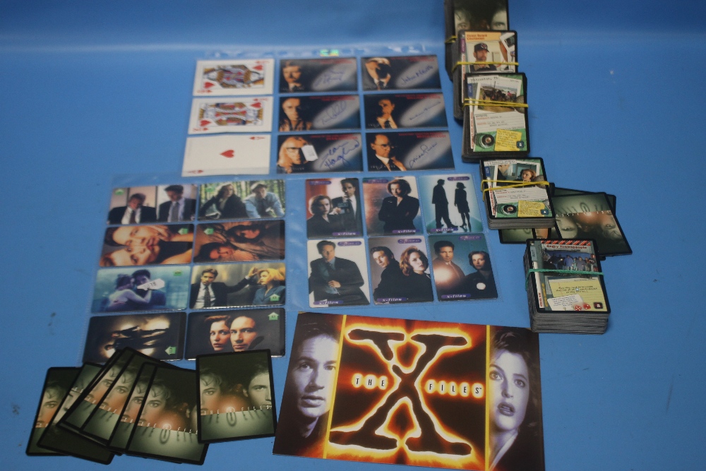 THREE SETS OF X-FILES PHONE CARDS, A SET OF SIGNED TRADING CARDS AND A BOX OF TRADING CARDS