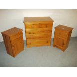 THREE SOLID PINE CHESTS OF DRAWERS, COMPRISING A TWO OVER THREE AND TWO BEDSIDE CHESTS