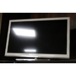 A SHARP 24" FLATSCREEN TV