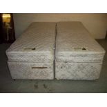 A KINGSIZE ZIP AND LINK BED WHICH SPLITS INTO TWO SMALL EURO SIZE SINGLES I.E. TWO BEDS IN ONE