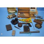 A BOX OF COLLECTABLES TO INCLUDE AN EARLY MARMITE TIN, BAKELITE VIDEOMASTER, CHANEL NO. 5 BOX,