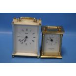 A TWO THOUSAND MILLENIUM CARRIAGE CLOCK TOGETHER WITH ANOTHER (2)