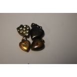 FOUR ANTIQUE HEART SHAPED CHARMS, ONE MARKED 15 CT