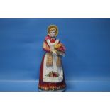 A ROYAL DOULTON FIGURINE 'OLD COUNTRY ROSES'