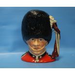 A ROYAL DOULTON CHARACTER JUG 'THE GUARDSMAN' D6755 MODELLED BY STANLEY JAMES TAYLOR