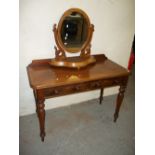 A TWO DRAW DESK AND SWIVEL MIRROR