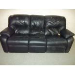 A BLACK LEATHER ELECTRIC RECLINER SOFA