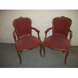 TWO REPRODUCTION OAK CARVED EASY CHAIRS