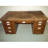 A VINTAGE TWIN PEDESTAL DESK