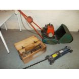 A SUFFOLK COLT PETROL LAWN MOWER, A CAR JACK, A WOODEN LOCKING TOOLBOX AND CONTENTS