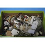 A BOX OF COSTUME JEWELLERY