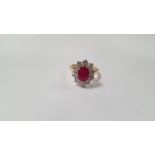 AN 18 CT YELLOW GOLD OVAL-CUT RUBY AND RBC DIAMOND CLUSTER RING, RUBY 2.25 CT, DIAMONDS 1.50 CT