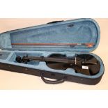 A CASED MODERN FORENZA BLACK VIOLIN AND BOW