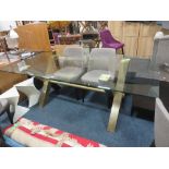 A LARGE MODERN GLASS DINING ABLE WITH METALLIC TRESTLE BASE, H 76 cm, W 100 cm, L 220 cm