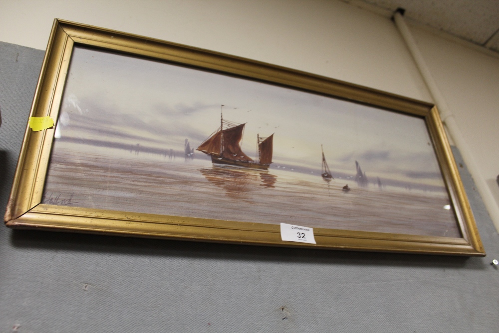 A GILT FRAMED AND GLAZED WATERCOLOUR DEPICTING SAIL SHIPS AT SEA INDISTINCTLY SIGNED LOWER LEFT