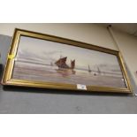A GILT FRAMED AND GLAZED WATERCOLOUR DEPICTING SAIL SHIPS AT SEA INDISTINCTLY SIGNED LOWER LEFT