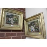 A PAIR OF GILT FRAMED AND GLAZED OIL ON CANVAS PAINTINGS DEPICTING STILL LIFE ON A MOSSY BANK SIGNED