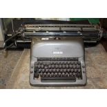 A VINTAGE GERMAN ADLER TYPEWRITER