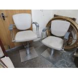 TWO RETRO STYLE BARBERS CHAIRS ON SWIVEL CHROME BASES