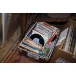 A BOX OF 7" SINGLES TO INCLUDE ELVIS PRESLEY, CREEDANCE CLEARWATER REVIVAL ETC...