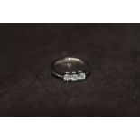 AN 18ct WHITE GOLD DIAMOND TRILOGY RING, RBC diamonds 0.50ct