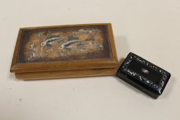 A MOTHER OF PEARL INLAID SNUFF BOX TOGETHER WITH A COPPER LIDDED WOODEN BOX DECORATED WITH FISH (2)