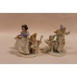 A PAIR OF LENOX DISNEY SNOW WHITE AND THE SEVEN DWARVES CANDLESTICKS
