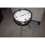 AN UNUSUAL MODERN OCCASIONAL TABLE WITH CLOCK INSERT TO TOP