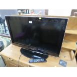 A SAMSUNG FLATSCREEN TV - REMOTE - HOUSE CLEARANCE