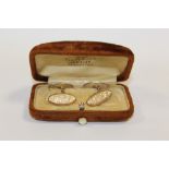 A PAIR OF BOXED 9CT GOLD CUFFLINKS