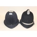 TWO VINTAGE POLICE HELMETS