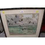 A FRAMED AND GLAZED COLOURED ETCHING DEPICTING SEAGULLS IN FLIGHT SIGNED HANS FIGURA