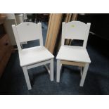 A PAIR OF CHILDRENS WOODEN CHAIRS